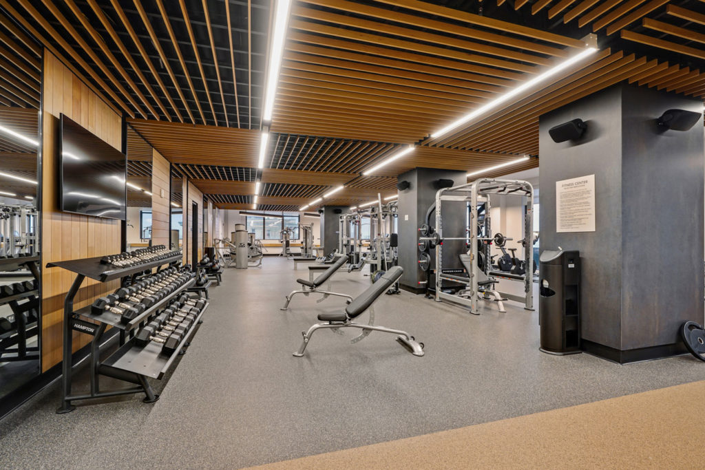 Plank Road fitness center with weights and workout equipment